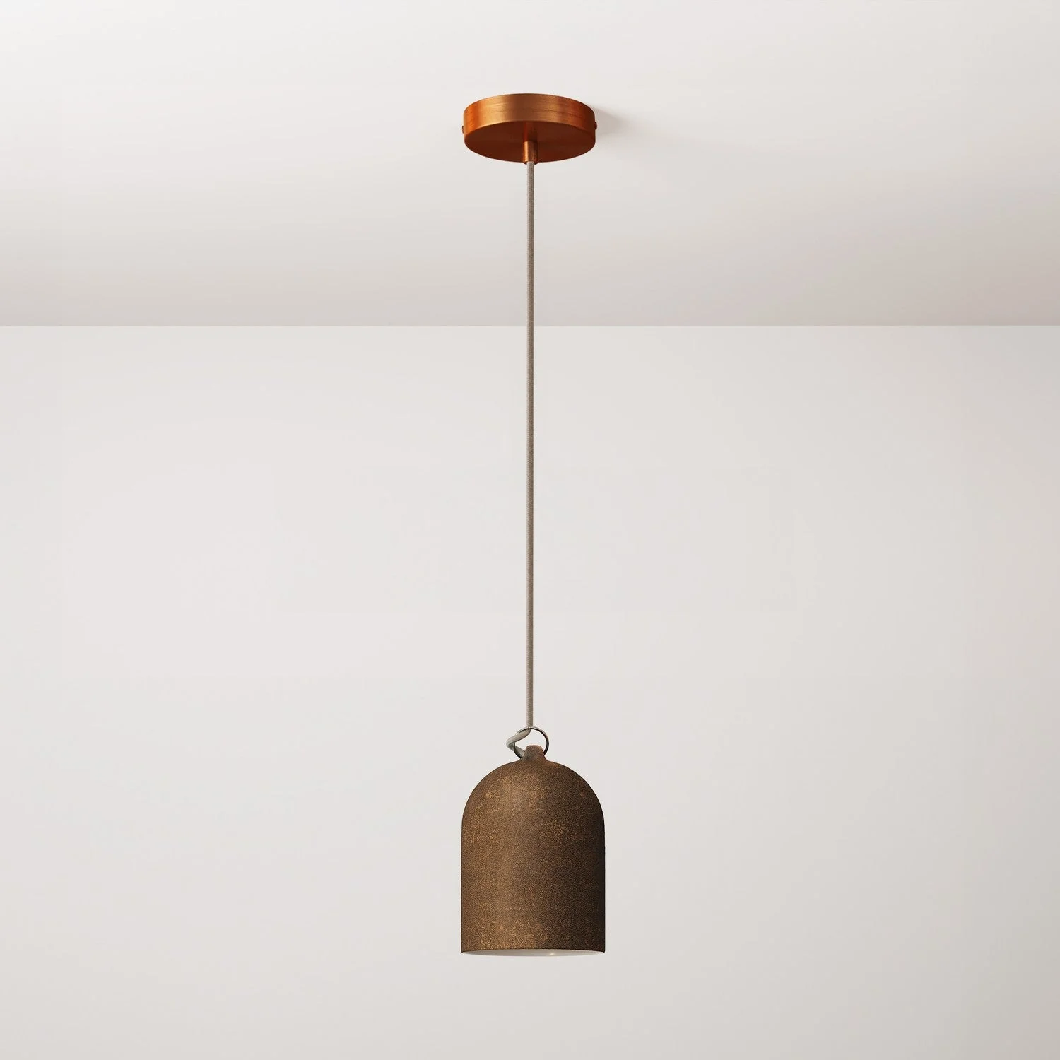 Pendant lamp with fabric cable and Mini Bell XS ceramic lampshade - Corten effect