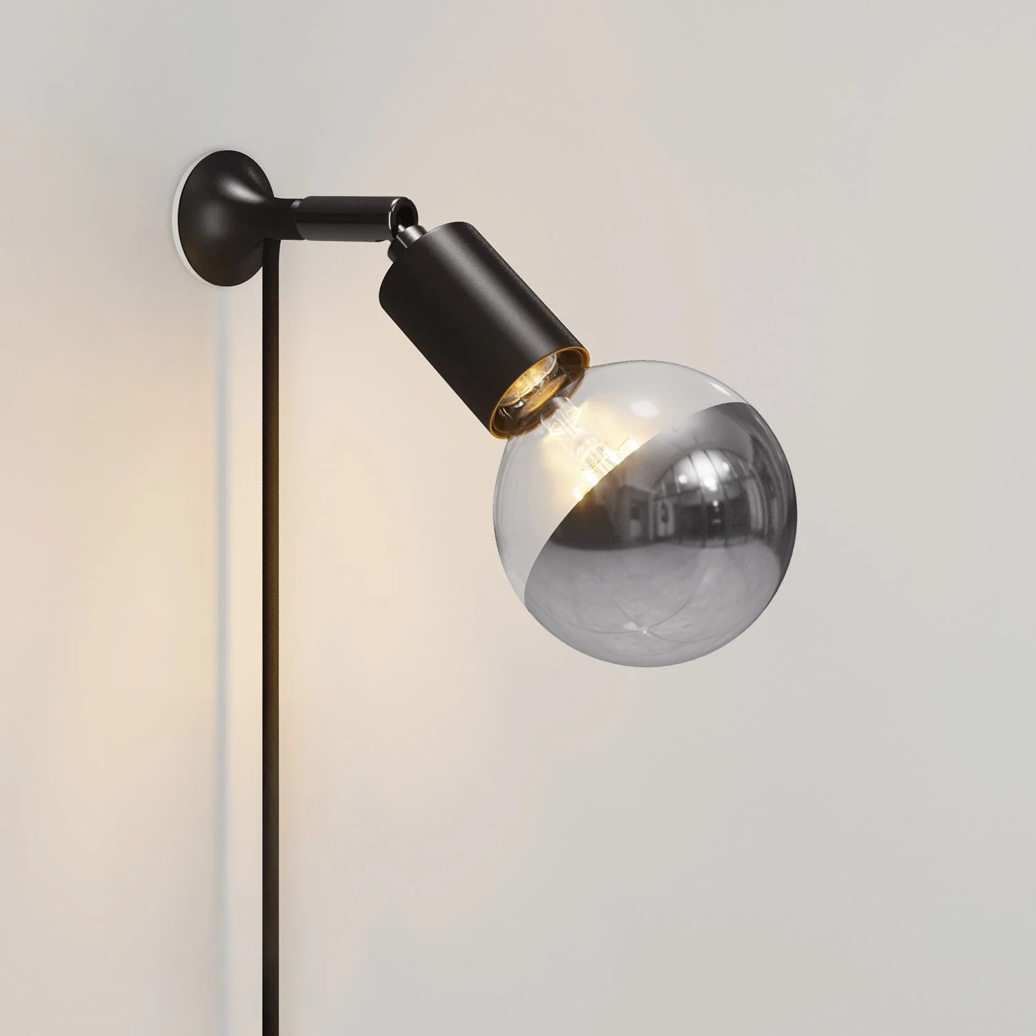 MAG-Y wall lamp with joint, half-sphere light bulb, and UK plug - Black